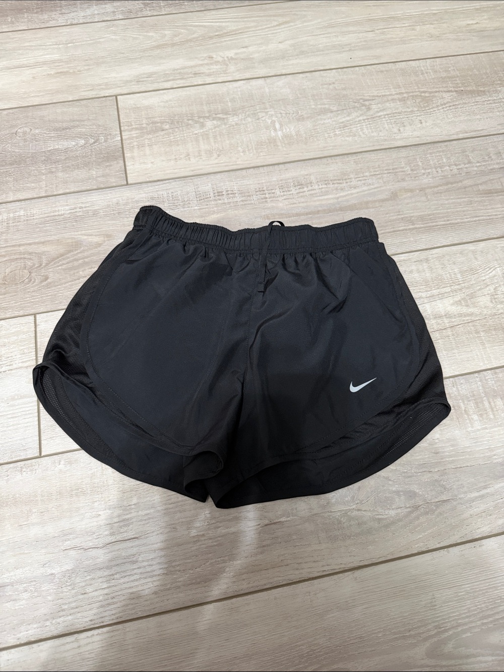 Nike Women’s Black Athletic Running Shorts with Silver Swoosh